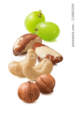 Cashew, hazelnut, brazil nuts and green grapes isolated on white background. Vertical layout. Cashew, hazelnut, brazil nuts and green grapes isolated on white background. Vertical layout. 114063264