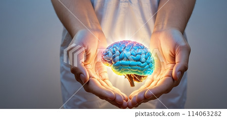 Colorful and illustrative depiction of a human brain hovering or being held above a human hand 114063282