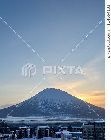 Mt. Yotei waking up with the morning sun behind it Mt. Yotei waking up with the morning sun behind it 114064133