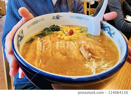 Jumbo ramen is a popular menu item at Tozanken, a famous restaurant in Niseko. 114064138