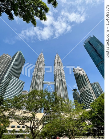 Skyscrapers and Petronas Twin Towers seen from KLCC Park Skyscrapers and Petronas Twin Towers seen from KLCC Park 114065578