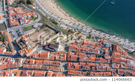 Aerial panorama of the city of Sines, Setubal Alentejo Portugal Europe. Aerial view of the old town fishing port, historic center and castle. Aerial panorama of the city of Sines, Setubal Alentejo Portugal Europe. Aerial view of the old town fishing port, historic center and castle. 114066663