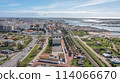 The Portuguese oceanfront city of Faro overlooking a theater, filmed with a drone. Ria Formosa in background. Algarve. 114066670