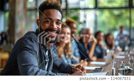 Group of People Sitting at a Long Table 114067831