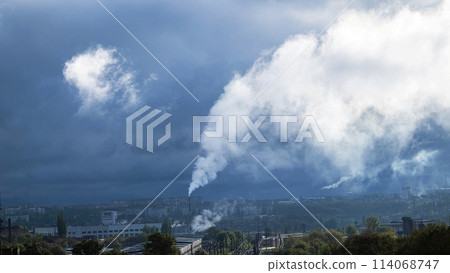 Smoke from a chimney against the backdrop of an industrial urban area, bad ecology concept 114068747