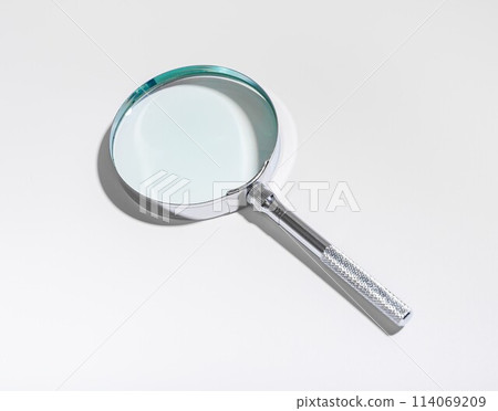 Auditor work, examining financial with magnifying glass. Fraud investigation, compliance check, tax 114069209