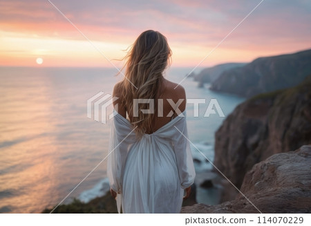 Woman Gazing at Seaside Sunset 114070229