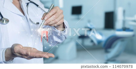 Doctor working with a tooth on a virtual screen. 114070978
