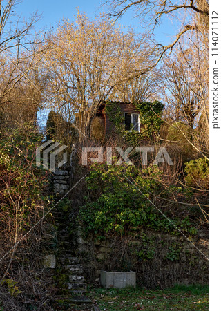 Autumn Serenity in Germany. Countryside Villages and Vineyards Along the River. autumn landscapes of Germany, featuring quaint cottages in a German village and picturesque vineyards adorning the 114071112