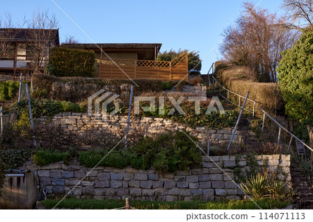Autumn Serenity in Germany. Countryside Villages and Vineyards Along the River. autumn landscapes of Germany, featuring quaint cottages in a German village and picturesque vineyards adorning the 114071113