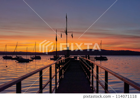 Bodensee Lake Sunset Panorama. Evening Sunlight Over Tranquil Waters. Sunset Vista at Lake Bodensee in Germany. 114071118