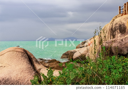 View of large rocks along the shore of the South China Sea. Sky Grottoes Park, Sanya, China 114071185