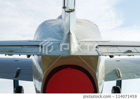 combat aircraft fighter bomber on a blue sky background combat aircraft fighter bomber on a blue sky background 114071459