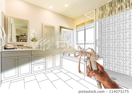 Professional Spray Painter Holding Spray Gun Spraying Renovated Bathroom Over Design Drawing. 114073275