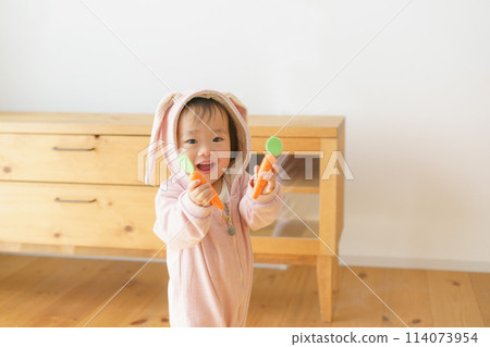 Baby in a rabbit's costume 114073954