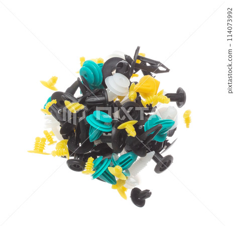 Car fender rivets fly explosion, colorful automobile fender rivets float explode, abstract cloud fly. Automobile plastic rivets splash throwing in Air. White background Isolated 114073992