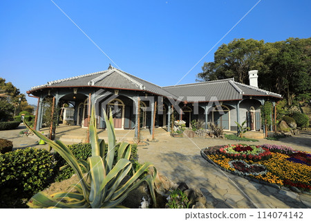 Clear blue sky, colorful flowers and the former Glover House (Nagasaki City, Nagasaki Prefecture, Japan) 114074142