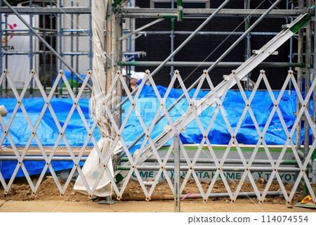 Construction site loaded with building materials 114074554