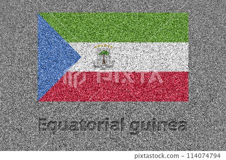 The flag of Equatorial Guinea painted on a stone slab with the words "Equatorial Guinea" carved into it 114074794