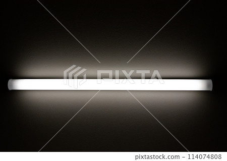 A tube-type lighting fixture that lights up in a dark room A tube-type lighting fixture that lights up in a dark room 114074808