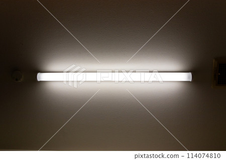 A tube-type lighting fixture that lights up in a dark room A tube-type lighting fixture that lights up in a dark room 114074810