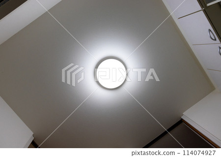 Ceiling lights illuminating the room 114074927