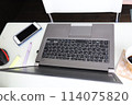 Computer on a desk at home 114075820
