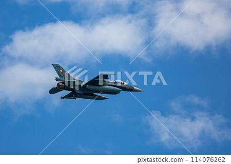 fighter plane flying in the sky 114076262