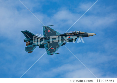 fighter plane flying in the sky 114076264