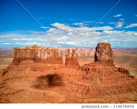 Large Rock Formation in Desert 114076859