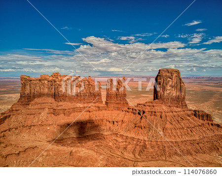 Massive Rock Formation in Monument Valley Desert 114076860