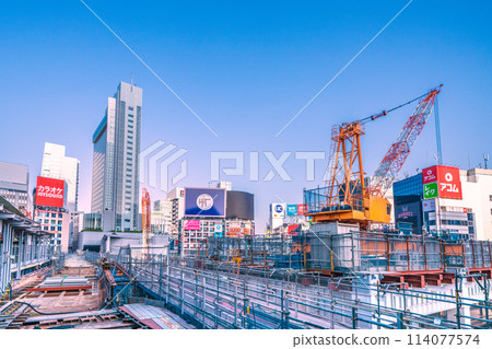 Tokyo cityscape in Japan - Early morning, Shibuya Station, redevelopment work, a large crane facing to the right, etc. - April 28th Tokyo cityscape in Japan - Early morning, Shibuya Station, redevelopment work, a large crane facing to the right, etc. - April 28th 114077574