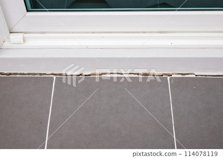 cracked concrete floor of the house 114078119