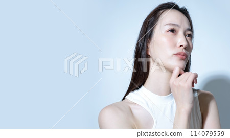 Worried, depressed woman image Worried, depressed woman image 114079559