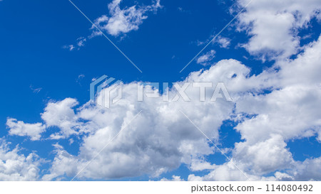 Many clouds flowing in the deep blue sky of midsummer Many clouds flowing in the deep blue sky of midsummer 114080492