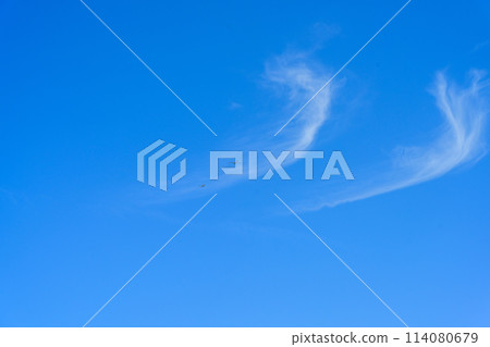 A glider flying in the gentle spring breeze and blue sky scenery A glider flying in the gentle spring breeze and blue sky scenery 114080679