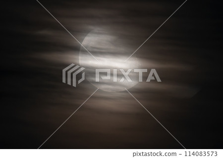 The moon hidden in the clouds 114083573