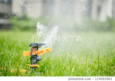 Automatic garden watering system closeup 114083861