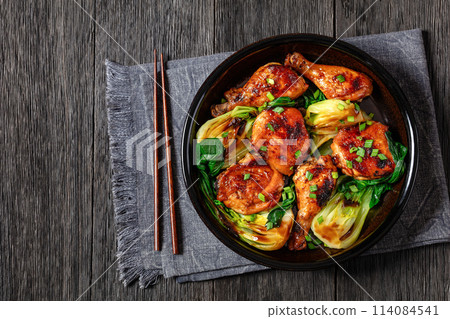 roasted asian glazed chicken thighs with bok choy roasted asian glazed chicken thighs with bok choy 114084541