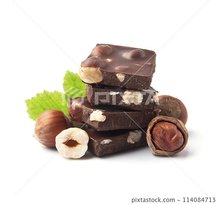 Chocolate with filbert on white backgrounds Chocolate with filbert on white backgrounds 114084713