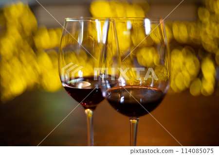 Golden Hour Toast With Fine Red Wine Golden Hour Toast With Fine Red Wine 114085075