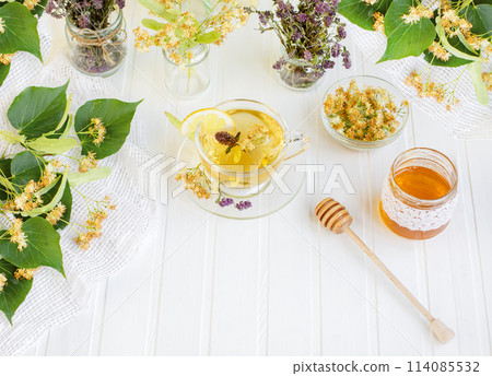 Hot tea from linden flowers with lemon natural honey, healthy treats for vitamins, strong immunity 114085532