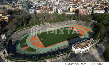 Aerial View of a Historic Stadium With Track and Field Amidst Urban Landscape at Dusk. Milan, Italy 114090230