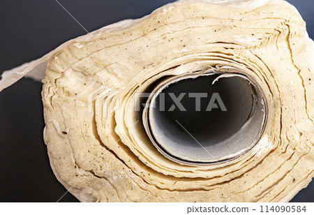 Aged scroll of paper Aged scroll of paper 114090584