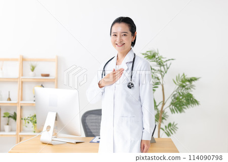 Middle-aged woman, white coat, leave it to us 114090798