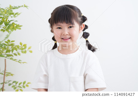 A smiling child A smiling child 114091427