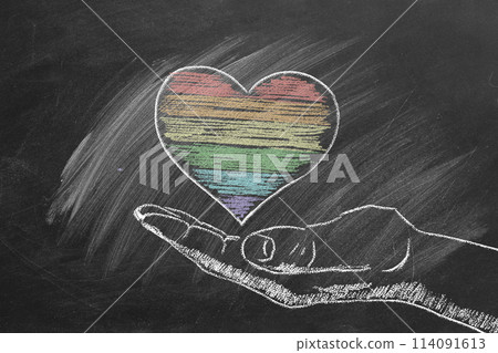 Hand-Drawing Chalk Rainbow Heart on Blackboard 114091613
