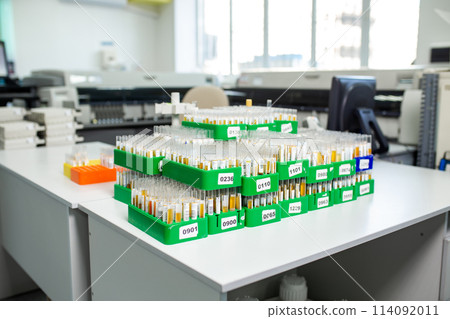 desktop with lab flasks and test tubes 114092011