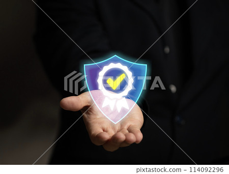 Man hand hold icon for security protection systems and satisfaction on virtual screen. Certified guarantee approval or secure access system concept. Feedback and survey success questionnaire rating. 114092296