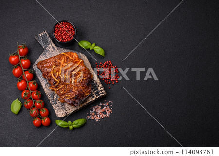 Delicious pork or beef ribs baked on the grill with salt, spices and herbs Delicious pork or beef ribs baked on the grill with salt, spices and herbs 114093761